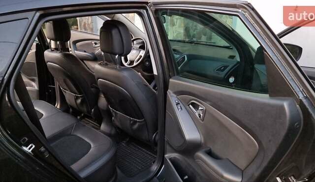 Черный Хендай их35, объемом двигателя 2 л и пробегом 264 тыс. км за 11900 $, фото 8 на Automoto.ua