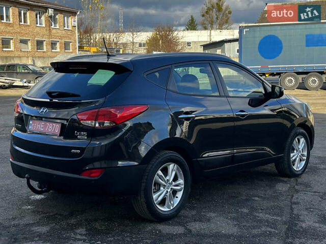 Чорний Хендай іх35, об'ємом двигуна 2 л та пробігом 226 тис. км за 12999 $, фото 4 на Automoto.ua