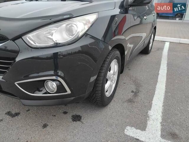 Черный Хендай их35, объемом двигателя 2 л и пробегом 249 тыс. км за 11900 $, фото 13 на Automoto.ua