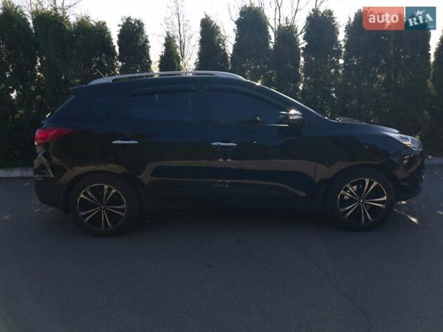 Чорний Хендай іх35, об'ємом двигуна 2.4 л та пробігом 213 тис. км за 12000 $, фото 3 на Automoto.ua