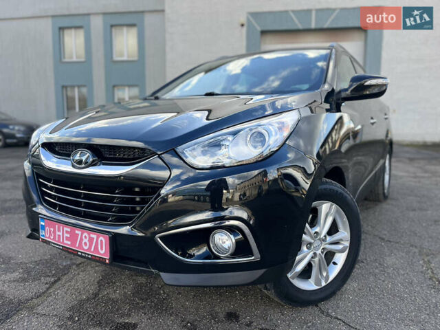 Чорний Хендай іх35, об'ємом двигуна 2 л та пробігом 226 тис. км за 12999 $, фото 17 на Automoto.ua