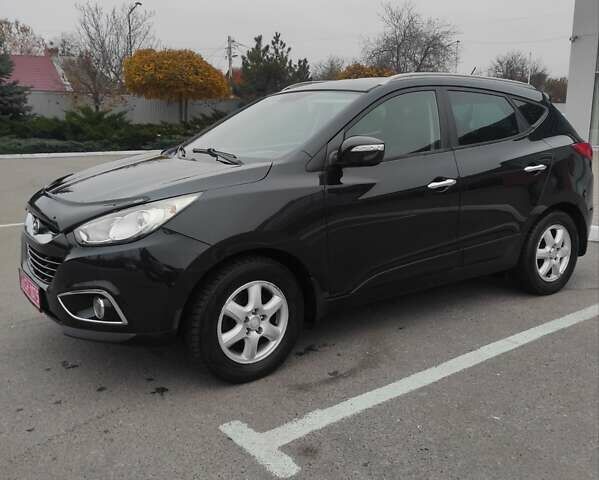 Черный Хендай их35, объемом двигателя 2 л и пробегом 249 тыс. км за 11900 $, фото 3 на Automoto.ua