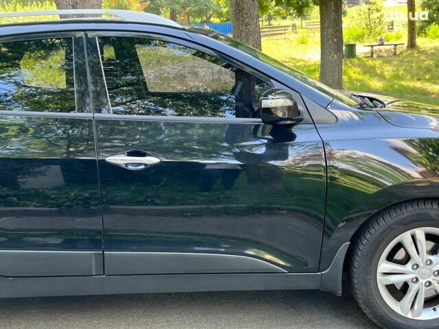 Чорний Хендай іх35, об'ємом двигуна 2 л та пробігом 195 тис. км за 13790 $, фото 10 на Automoto.ua
