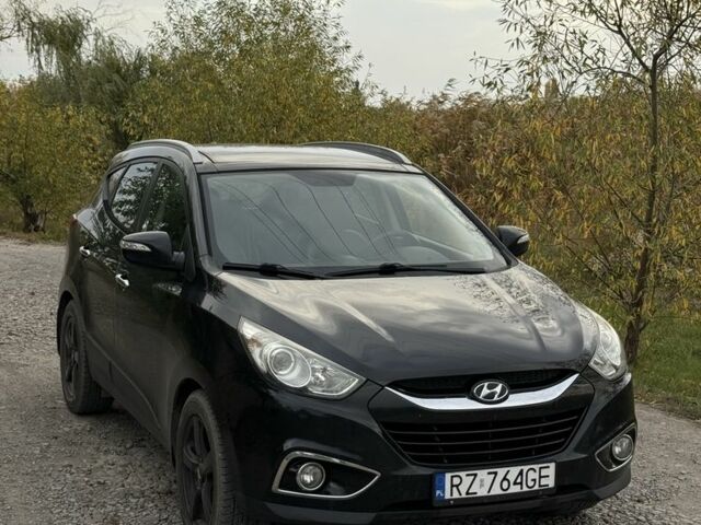 Чорний Хендай іх35, об'ємом двигуна 2 л та пробігом 237 тис. км за 7100 $, фото 2 на Automoto.ua