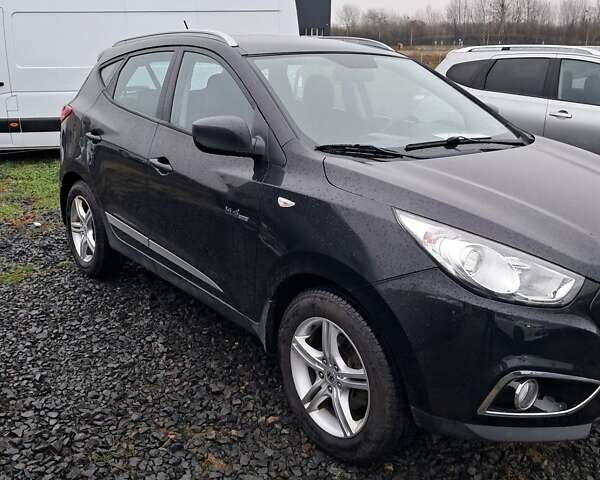 Чорний Хендай іх35, об'ємом двигуна 1.7 л та пробігом 167 тис. км за 10900 $, фото 2 на Automoto.ua