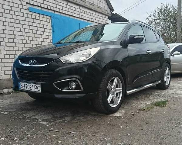 Черный Хендай их35, объемом двигателя 2 л и пробегом 190 тыс. км за 12800 $, фото 1 на Automoto.ua