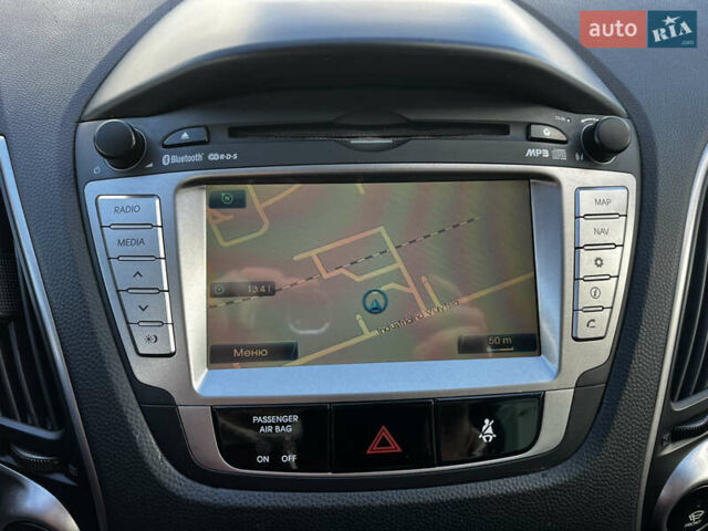 Чорний Хендай іх35, об'ємом двигуна 2 л та пробігом 225 тис. км за 12999 $, фото 29 на Automoto.ua