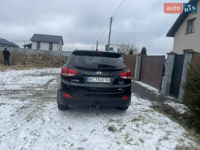 Черный Хендай их35, объемом двигателя 2 л и пробегом 197 тыс. км за 11300 $, фото 4 на Automoto.ua