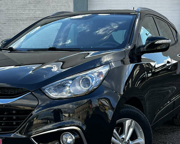 Чорний Хендай іх35, об'ємом двигуна 2 л та пробігом 226 тис. км за 12999 $, фото 8 на Automoto.ua