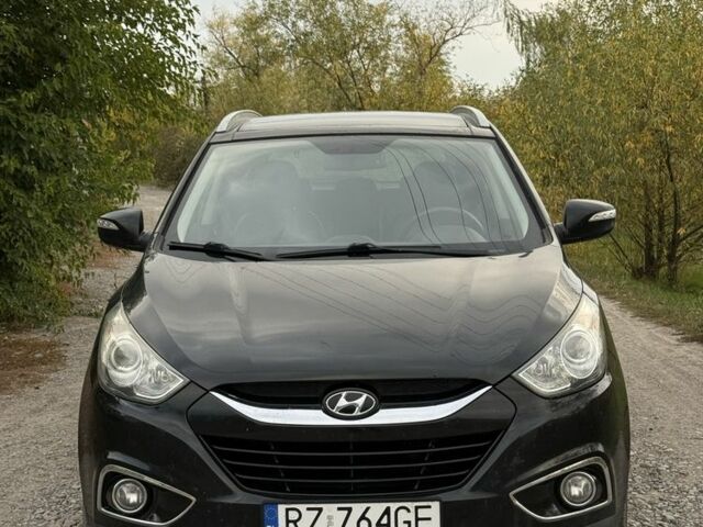 Чорний Хендай іх35, об'ємом двигуна 2 л та пробігом 237 тис. км за 7100 $, фото 1 на Automoto.ua