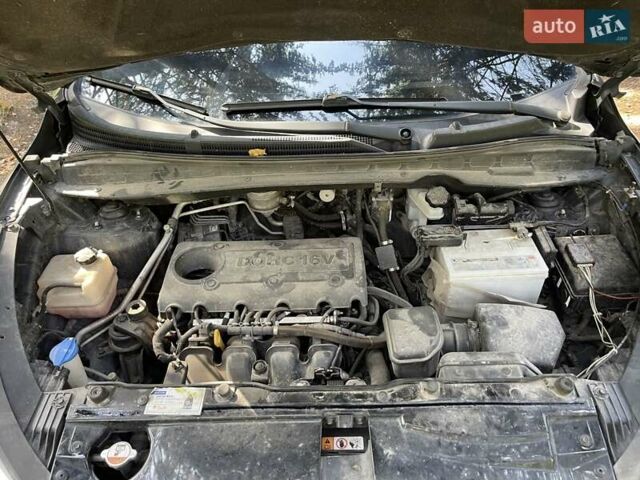 Чорний Хендай іх35, об'ємом двигуна 2 л та пробігом 287 тис. км за 10500 $, фото 7 на Automoto.ua