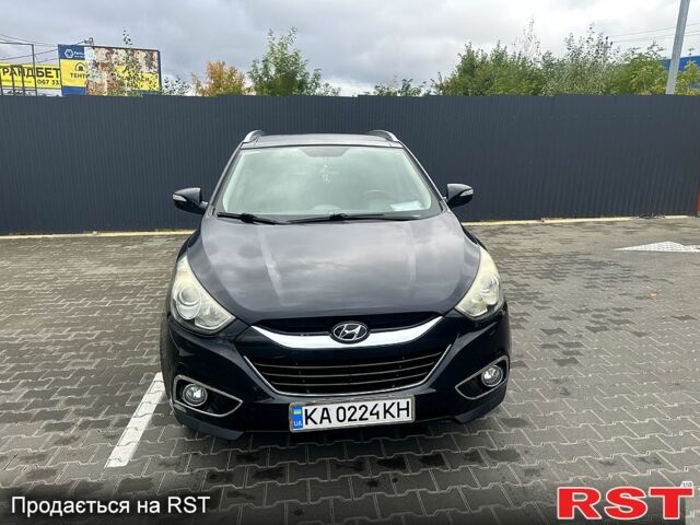 Чорний Хендай іх35, об'ємом двигуна 2 л та пробігом 116 тис. км за 10800 $, фото 1 на Automoto.ua