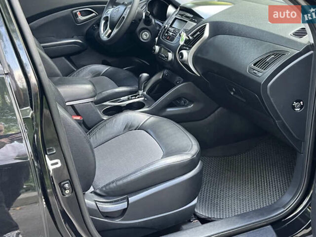 Чорний Хендай іх35, об'ємом двигуна 2 л та пробігом 196 тис. км за 12900 $, фото 18 на Automoto.ua