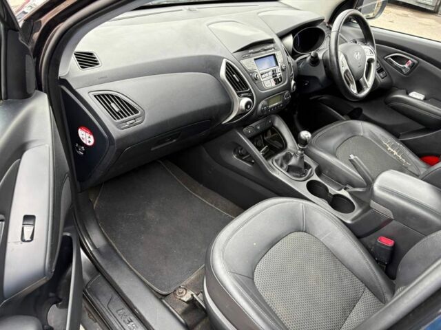 Чорний Хендай іх35, об'ємом двигуна 2 л та пробігом 141 тис. км за 4000 $, фото 12 на Automoto.ua