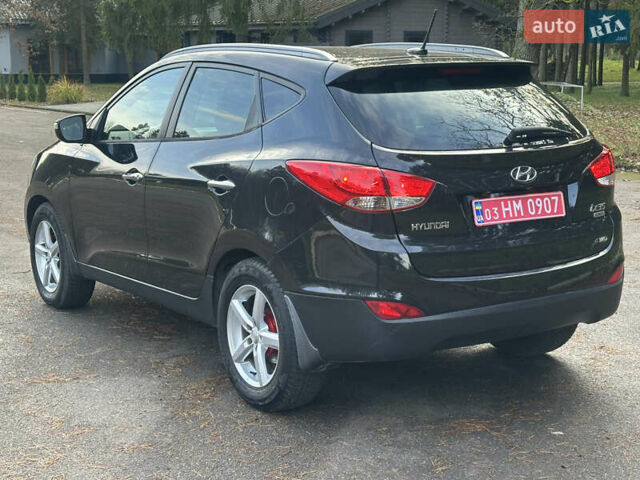 Чорний Хендай іх35, об'ємом двигуна 2 л та пробігом 240 тис. км за 12500 $, фото 6 на Automoto.ua