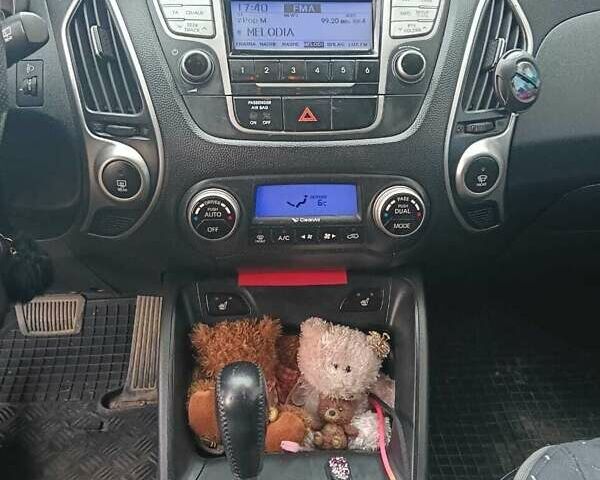 Черный Хендай их35, объемом двигателя 2 л и пробегом 190 тыс. км за 12800 $, фото 7 на Automoto.ua