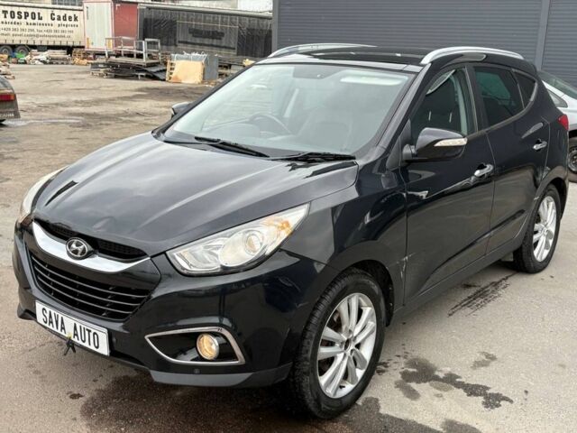 Чорний Хендай іх35, об'ємом двигуна 2 л та пробігом 141 тис. км за 4000 $, фото 2 на Automoto.ua