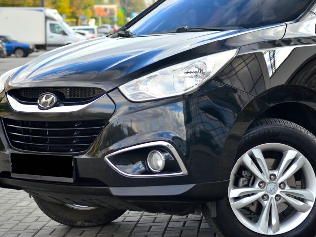 Черный Хендай их35, объемом двигателя 2 л и пробегом 141 тыс. км за 12700 $, фото 4 на Automoto.ua