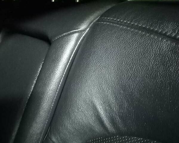 Чорний Хендай іх35, об'ємом двигуна 2 л та пробігом 157 тис. км за 12000 $, фото 5 на Automoto.ua