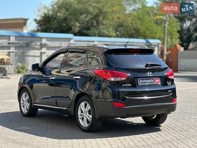 Черный Хендай их35, объемом двигателя 2 л и пробегом 218 тыс. км за 12230 $, фото 6 на Automoto.ua