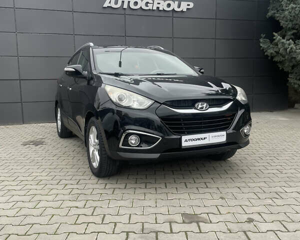 Черный Хендай их35, объемом двигателя 2 л и пробегом 179 тыс. км за 12000 $, фото 1 на Automoto.ua