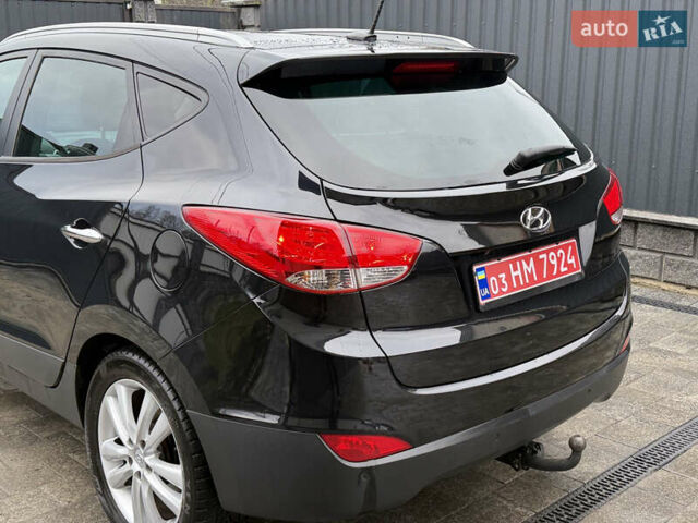 Чорний Хендай іх35, об'ємом двигуна 2 л та пробігом 206 тис. км за 13099 $, фото 35 на Automoto.ua