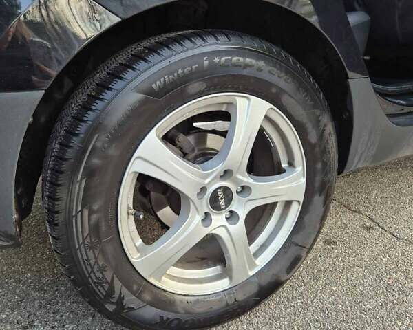 Черный Хендай их35, объемом двигателя 2 л и пробегом 221 тыс. км за 12000 $, фото 13 на Automoto.ua