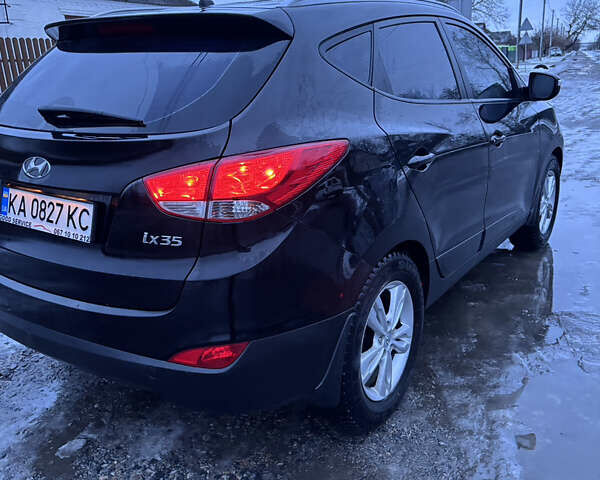 Чорний Хендай іх35, об'ємом двигуна 2 л та пробігом 252 тис. км за 11000 $, фото 6 на Automoto.ua