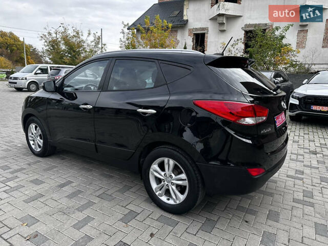 Черный Хендай их35, объемом двигателя 2 л и пробегом 197 тыс. км за 13650 $, фото 7 на Automoto.ua