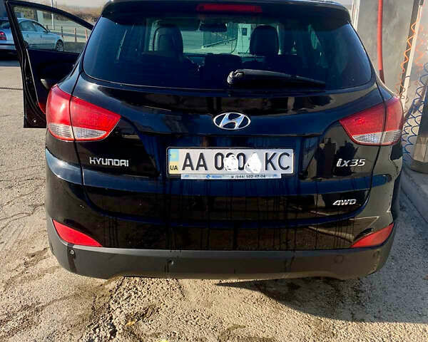 Черный Хендай их35, объемом двигателя 2 л и пробегом 185 тыс. км за 11200 $, фото 4 на Automoto.ua