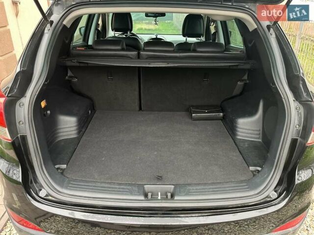 Чорний Хендай іх35, об'ємом двигуна 2 л та пробігом 181 тис. км за 12200 $, фото 5 на Automoto.ua