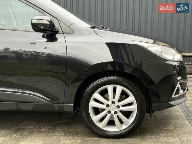 Чорний Хендай іх35, об'ємом двигуна 2 л та пробігом 206 тис. км за 13099 $, фото 16 на Automoto.ua