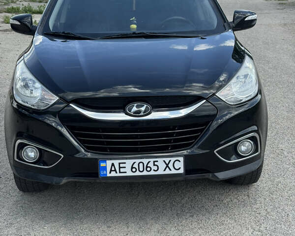 Черный Хендай их35, объемом двигателя 2 л и пробегом 121 тыс. км за 14000 $, фото 5 на Automoto.ua