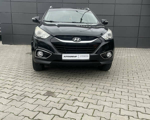 Черный Хендай их35, объемом двигателя 2 л и пробегом 179 тыс. км за 12000 $, фото 2 на Automoto.ua