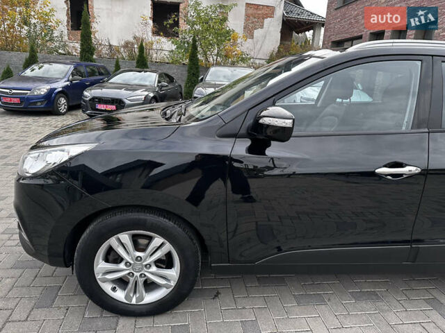 Черный Хендай их35, объемом двигателя 2 л и пробегом 197 тыс. км за 13650 $, фото 14 на Automoto.ua