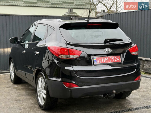 Чорний Хендай іх35, об'ємом двигуна 2 л та пробігом 206 тис. км за 13099 $, фото 29 на Automoto.ua