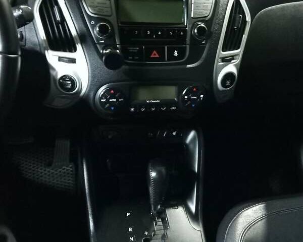 Чорний Хендай іх35, об'ємом двигуна 2 л та пробігом 157 тис. км за 12000 $, фото 12 на Automoto.ua