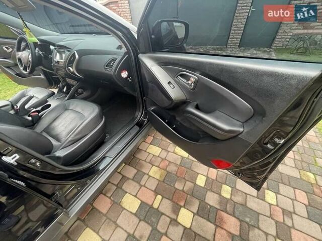 Чорний Хендай іх35, об'ємом двигуна 2 л та пробігом 210 тис. км за 12700 $, фото 6 на Automoto.ua