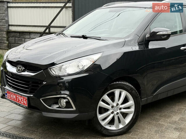 Чорний Хендай іх35, об'ємом двигуна 2 л та пробігом 206 тис. км за 13099 $, фото 28 на Automoto.ua
