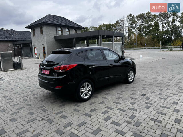 Черный Хендай их35, объемом двигателя 2 л и пробегом 197 тыс. км за 13650 $, фото 27 на Automoto.ua