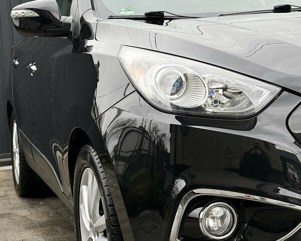 Чорний Хендай іх35, об'ємом двигуна 2 л та пробігом 206 тис. км за 13099 $, фото 15 на Automoto.ua