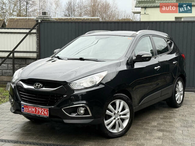 Чорний Хендай іх35, об'ємом двигуна 2 л та пробігом 206 тис. км за 13099 $, фото 26 на Automoto.ua