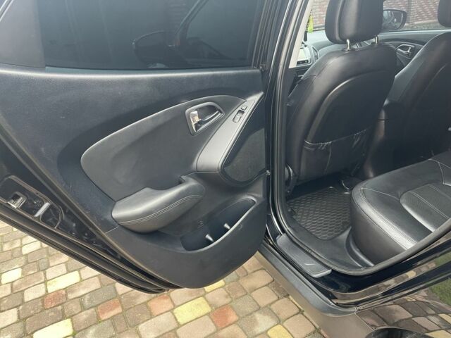 Чорний Хендай іх35, об'ємом двигуна 2 л та пробігом 210 тис. км за 12700 $, фото 10 на Automoto.ua