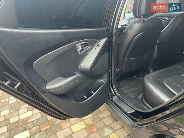 Чорний Хендай іх35, об'ємом двигуна 2 л та пробігом 210 тис. км за 12700 $, фото 9 на Automoto.ua