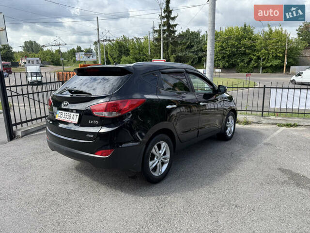 Черный Хендай их35, объемом двигателя 2 л и пробегом 156 тыс. км за 12700 $, фото 14 на Automoto.ua