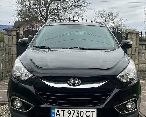 Чорний Хендай іх35, об'ємом двигуна 2 л та пробігом 181 тис. км за 12200 $, фото 3 на Automoto.ua