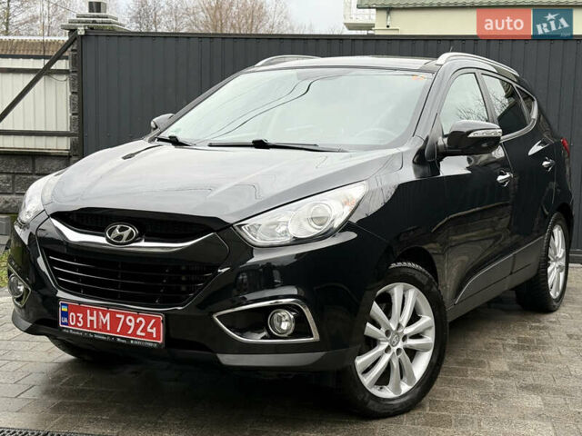 Чорний Хендай іх35, об'ємом двигуна 2 л та пробігом 206 тис. км за 13099 $, фото 23 на Automoto.ua