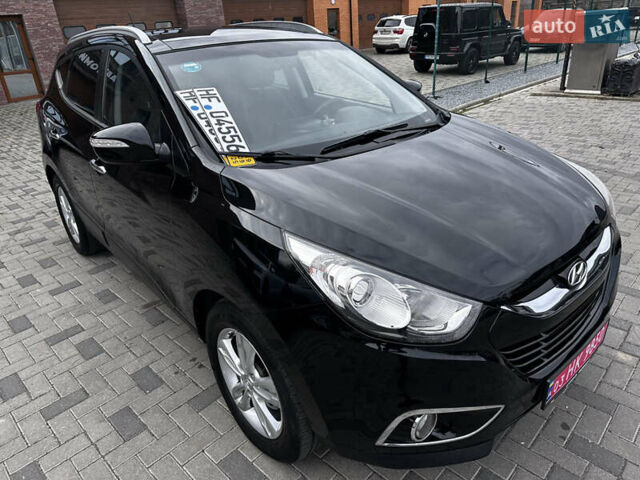 Черный Хендай их35, объемом двигателя 2 л и пробегом 197 тыс. км за 13650 $, фото 24 на Automoto.ua
