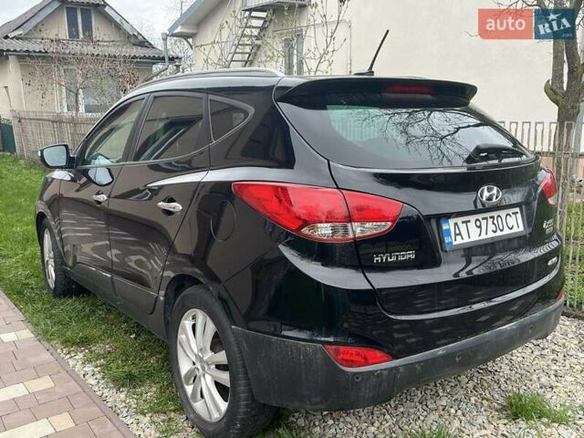 Чорний Хендай іх35, об'ємом двигуна 2 л та пробігом 181 тис. км за 12200 $, фото 2 на Automoto.ua