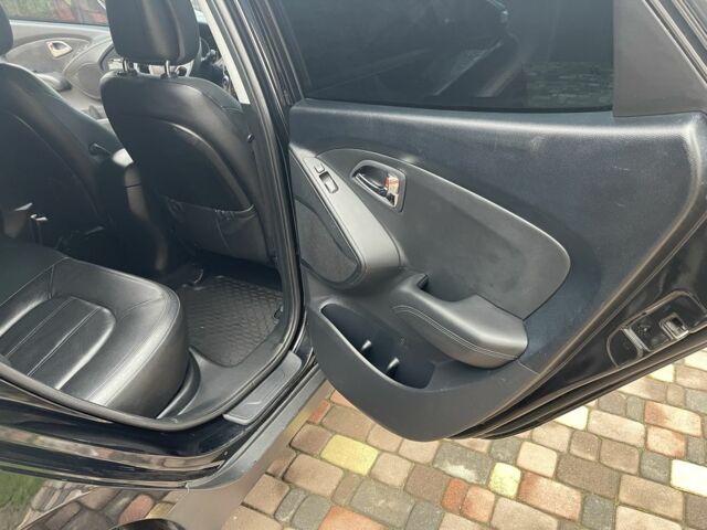 Чорний Хендай іх35, об'ємом двигуна 2 л та пробігом 210 тис. км за 12700 $, фото 11 на Automoto.ua